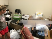 Piles of office supplies during Cofer Law move.